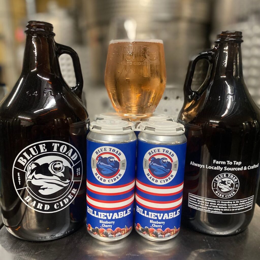 growlers and cans of cider in tap room